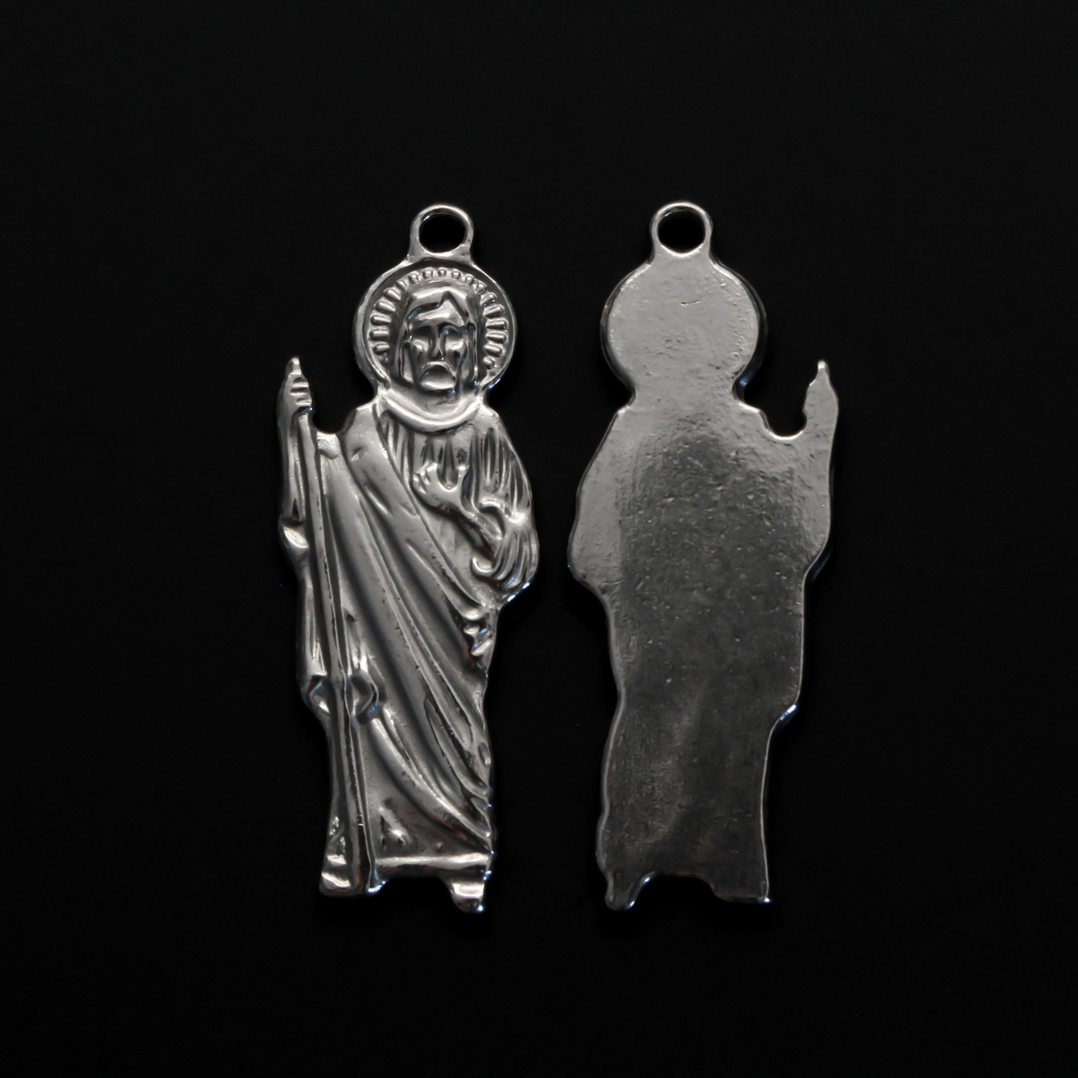 Jesus Christ figural charm pendant that depicts Jesus as the Good Shepherd holding a shepherd's staff., 1.5" long