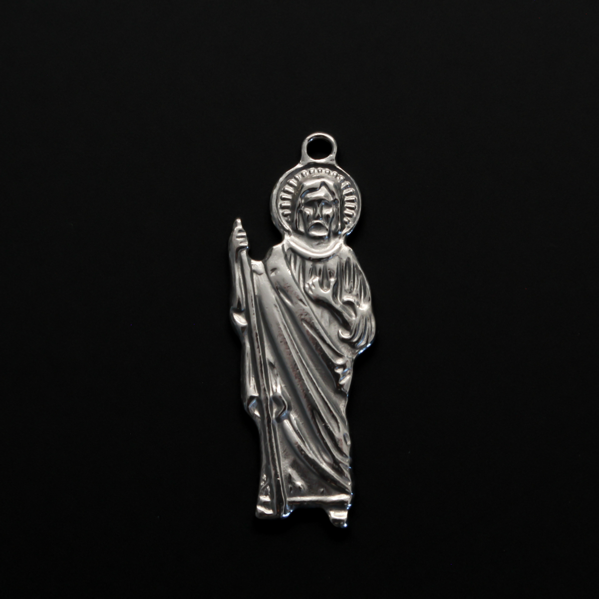 Jesus Christ figural charm pendant that depicts Jesus as the Good Shepherd holding a shepherd's staff., 1.5" long
