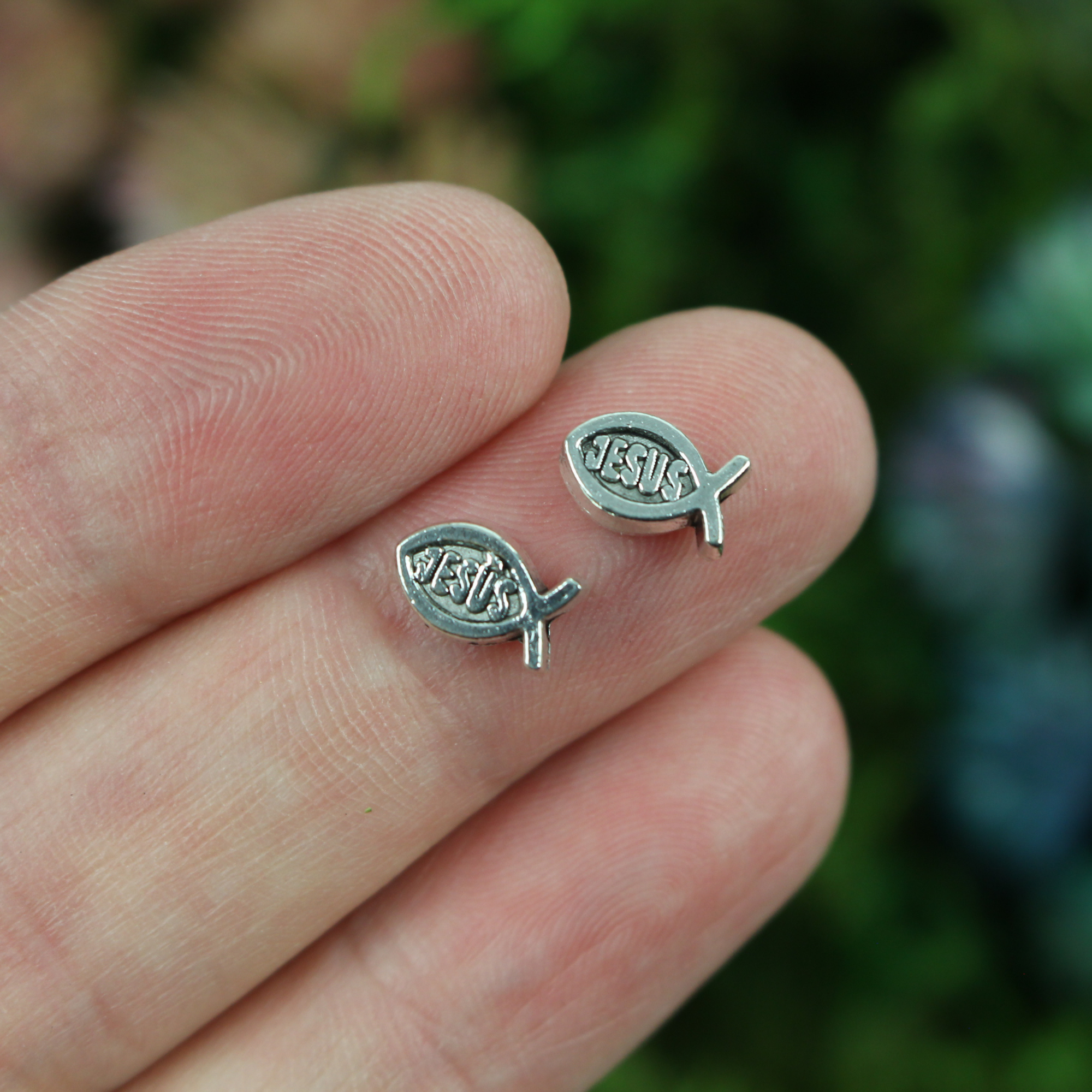 Tiny silver fish shaped beads with Jesus written on both sides, 8mmx5mm
