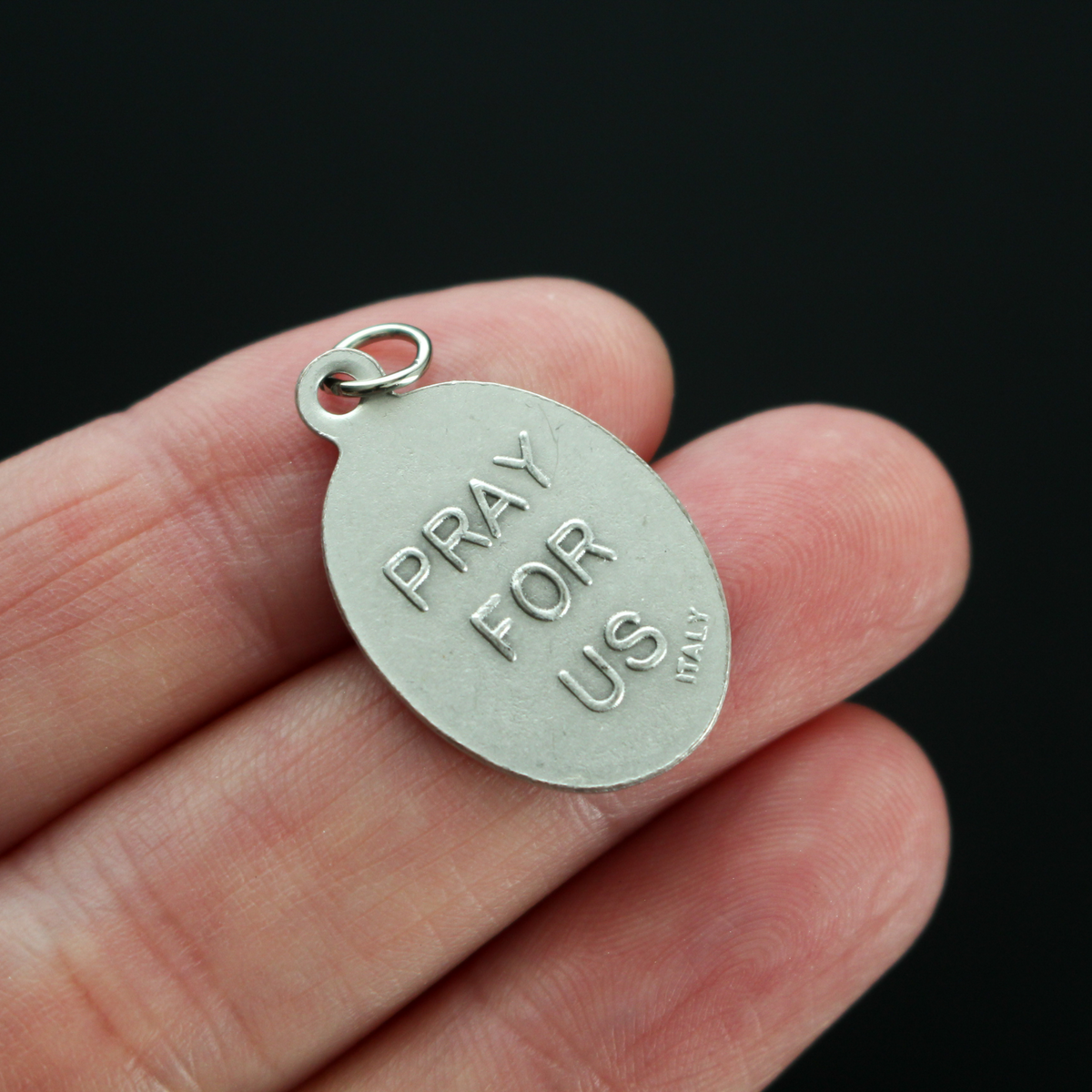 Jesus Christ depicted as the good shepherd, 0ne inch oval die-cast medal made in Italy