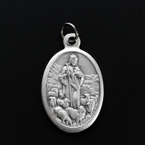 Jesus Christ depicted as the good shepherd, 0ne inch oval die-cast medal made in Italy
