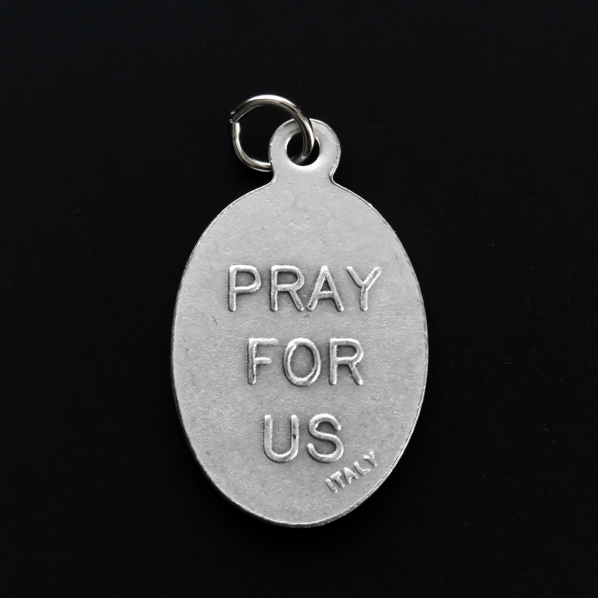 Jesus Christ depicted as the good shepherd, 0ne inch oval die-cast medal made in Italy