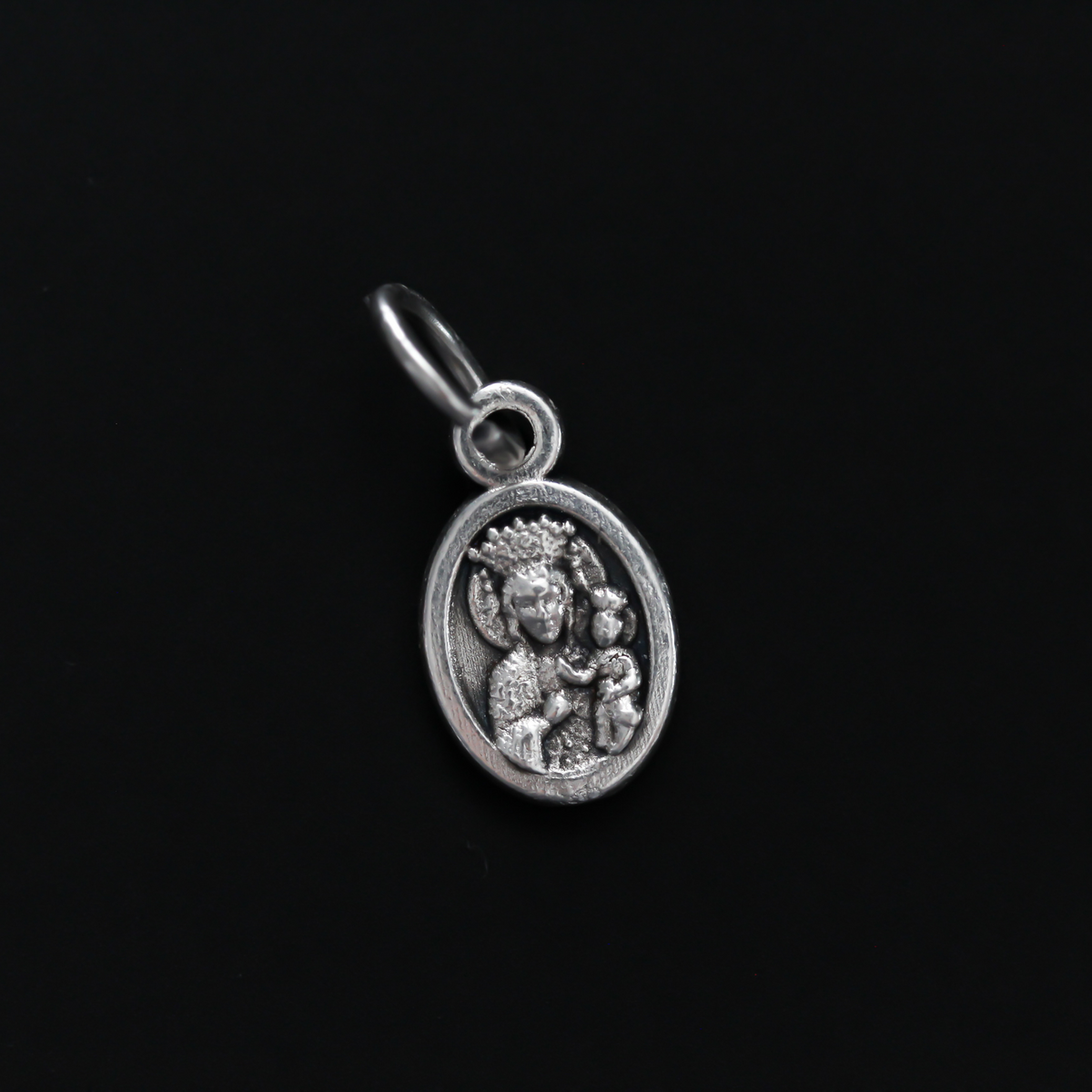 St. John Paul II mini medal that depicts the saint on the front and Our Lady of Perpetual Help on the back