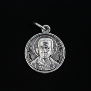 Saint José Gabriel del Rosario Brochero medal. The front depicts the saint and the reverse is marked "Pray For Us" in Spanish: Ruega Por Nosotros