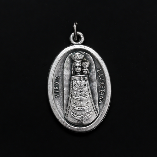 Our Lady of Loreto or Our Lady of Lauretana medal. The front depicts Our Lady and the reverse is marked "Pray For Us"