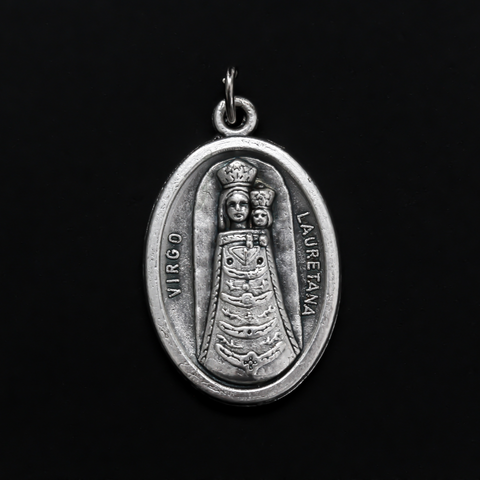Our Lady of Loreto or Our Lady of Lauretana medal. The front depicts Our Lady and the reverse is marked "Pray For Us"