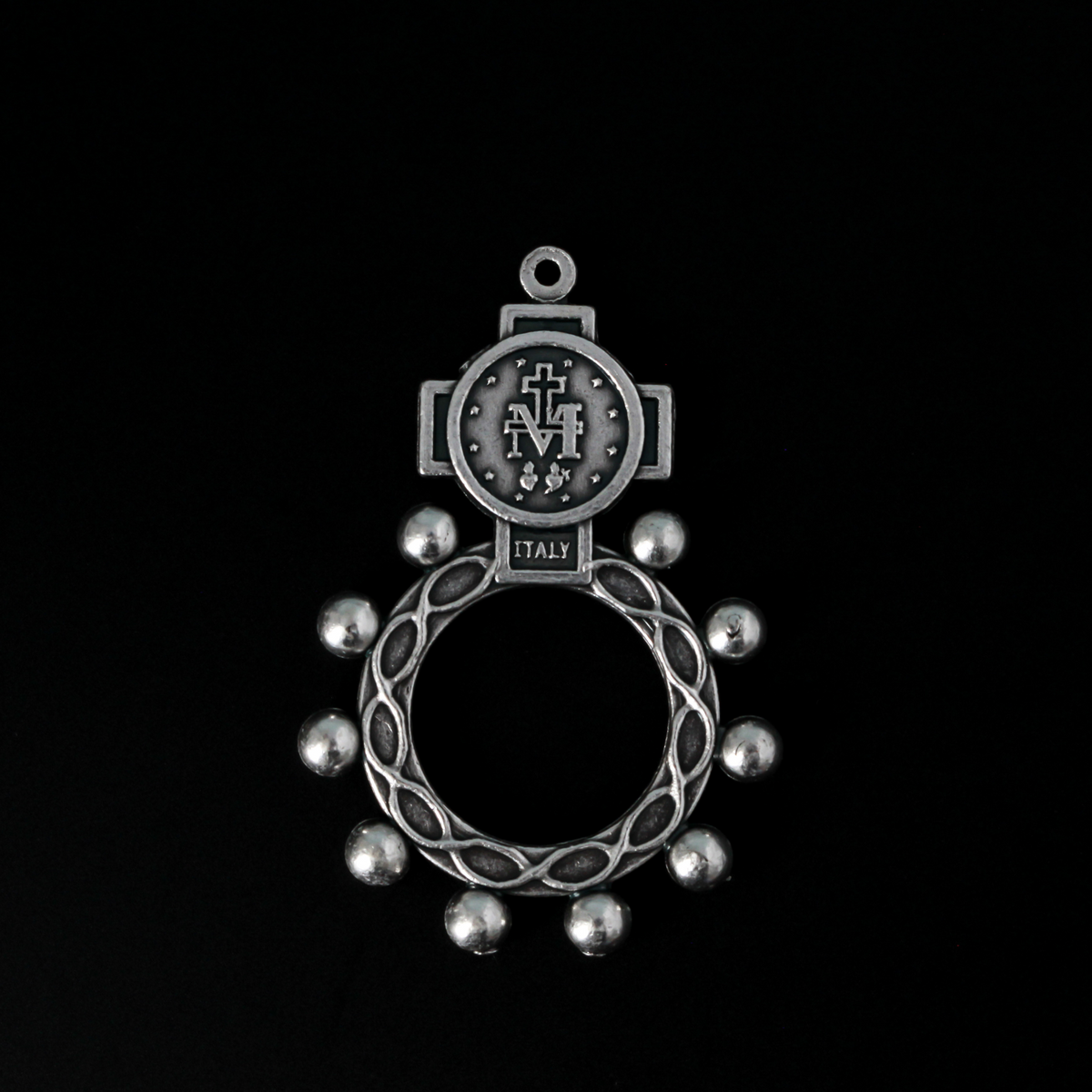 One decade rosary that features the Miraculous Medal in the cross