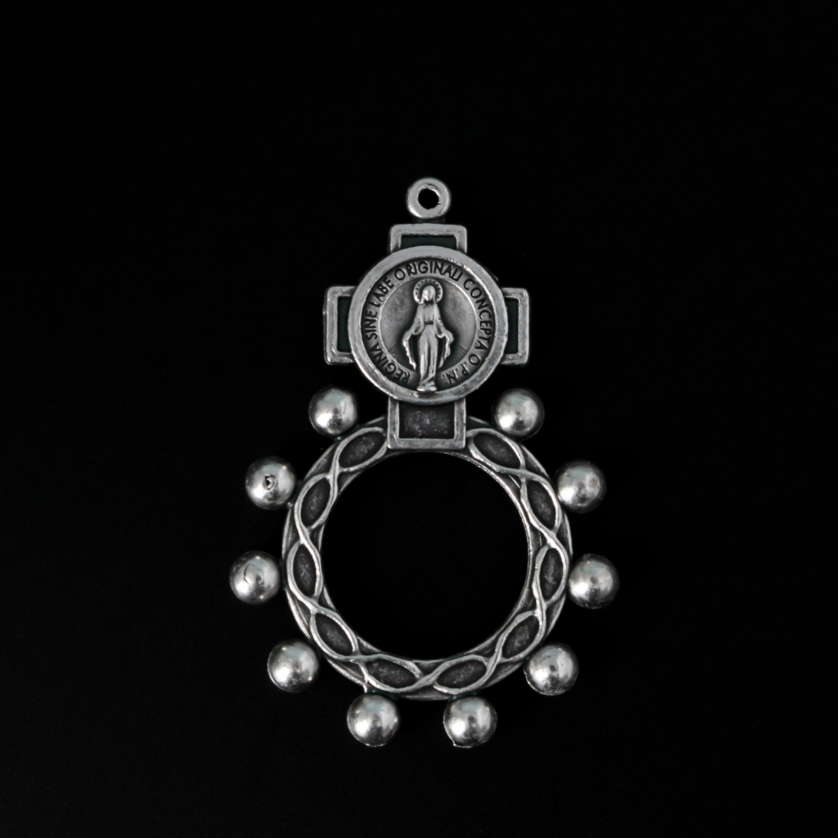 One decade rosary that features the Miraculous Medal in the cross