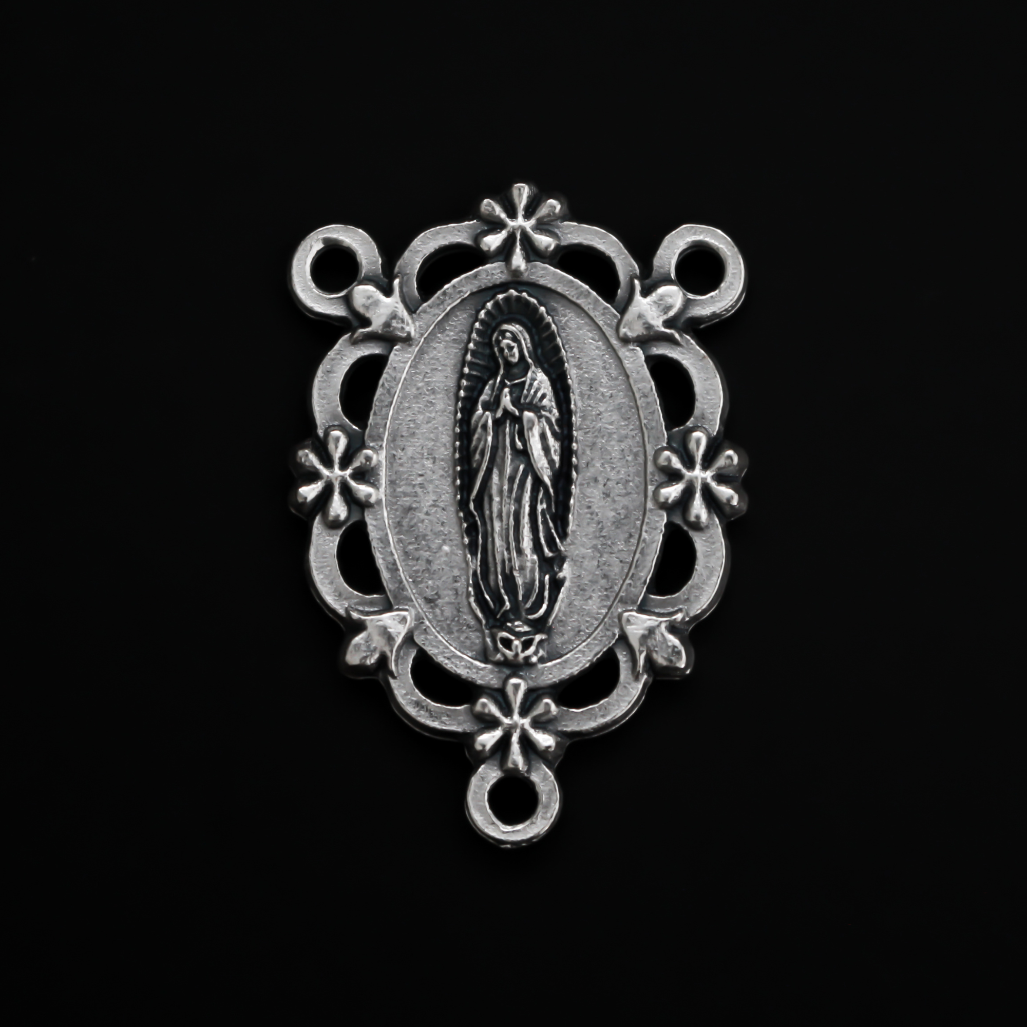 Our Lady of Guadalupe rosary centerpiece with filigree cut out design and floral detailing