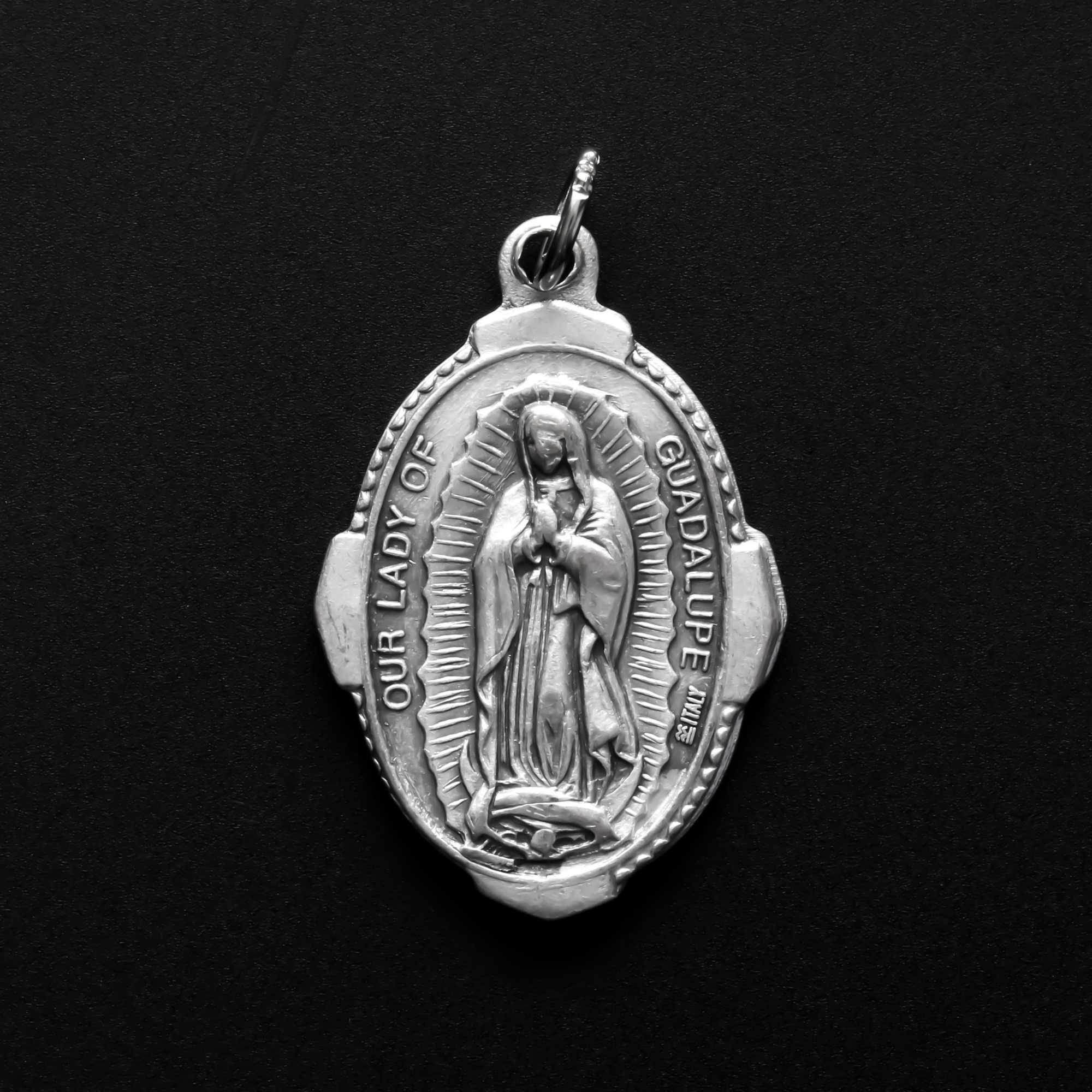Our Lady of Guadalupe religious medal with deluxe ornate border