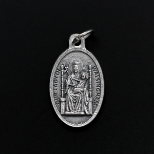 Our Lady of Walsingham medal that depicts Our Lady on the front and the words "Our Lady of Walsingham Pray For Us" on the back.