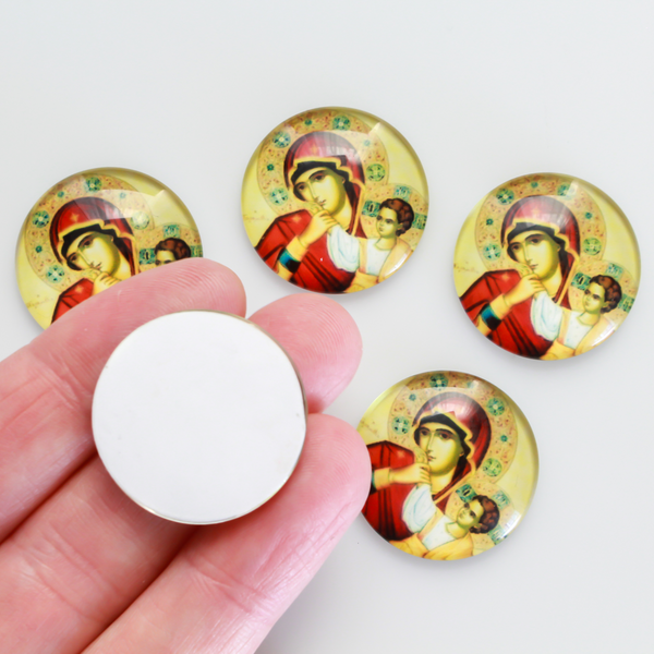 25mm Round glass cabochon depicting the Virgin Mary with child Jesus. These will fit cabochon settings with a 25mm tray