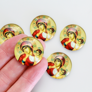 25mm Round glass cabochon depicting the Virgin Mary with child Jesus. These will fit cabochon settings with a 25mm tray
