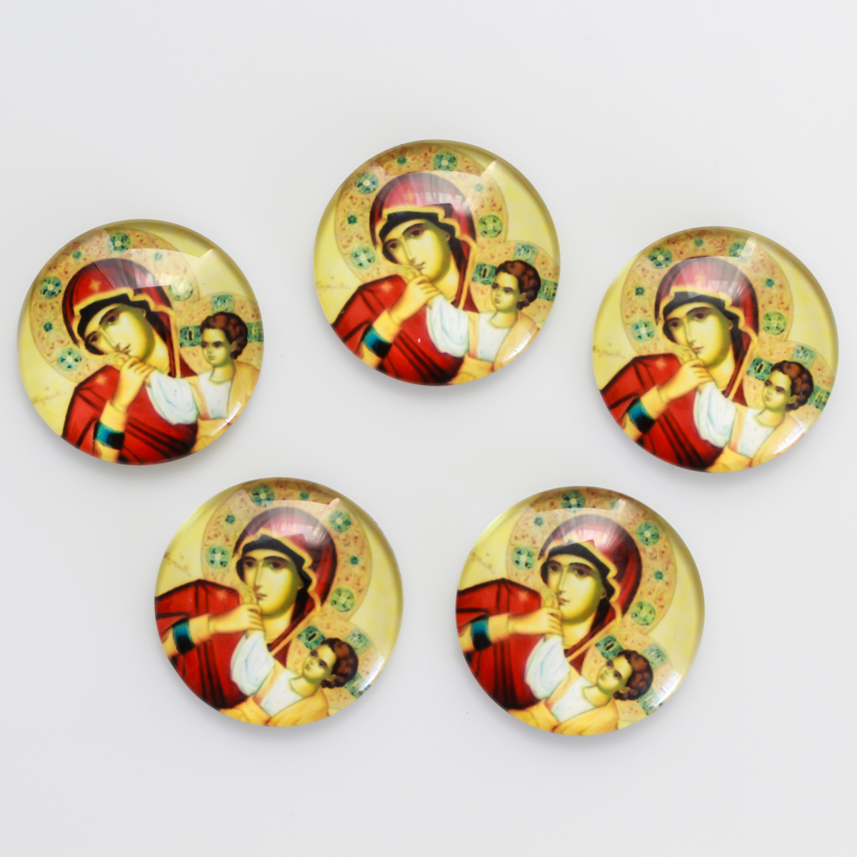 25mm Round glass cabochon depicting the Virgin Mary with child Jesus. These will fit cabochon settings with a 25mm tray