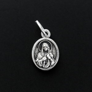 small, beautifully detailed version of the Immaculate Heart of Mary medal that depicts the Sanctuary of Tears on the reverse side