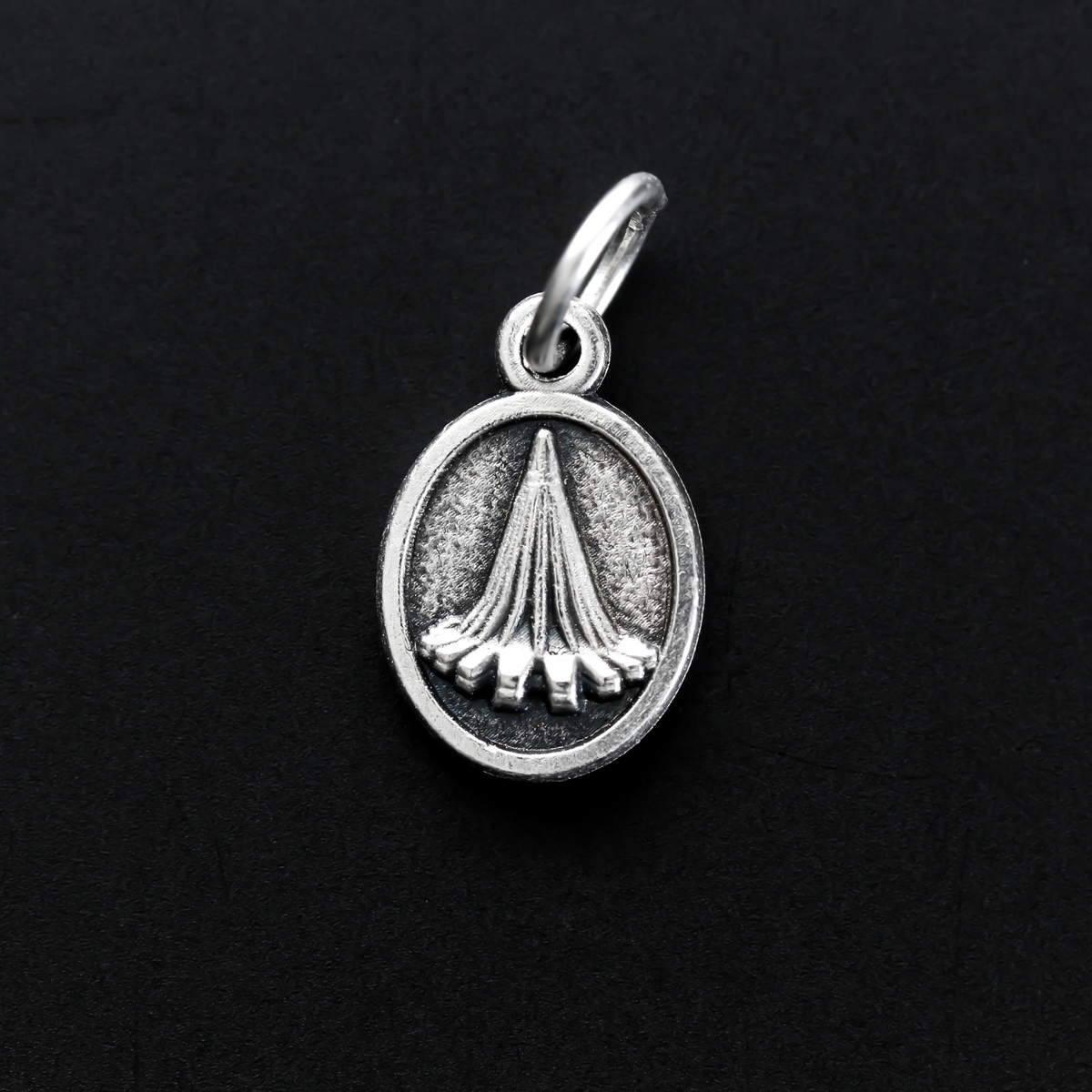 small, beautifully detailed version of the Immaculate Heart of Mary medal that depicts the Sanctuary of Tears on the reverse side