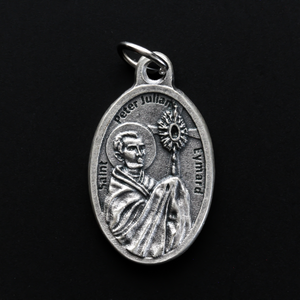 Saint Peter Julian Eymard medal that depicts the saint on the front and Our Lady of the Most Blessed Sacrament on the back