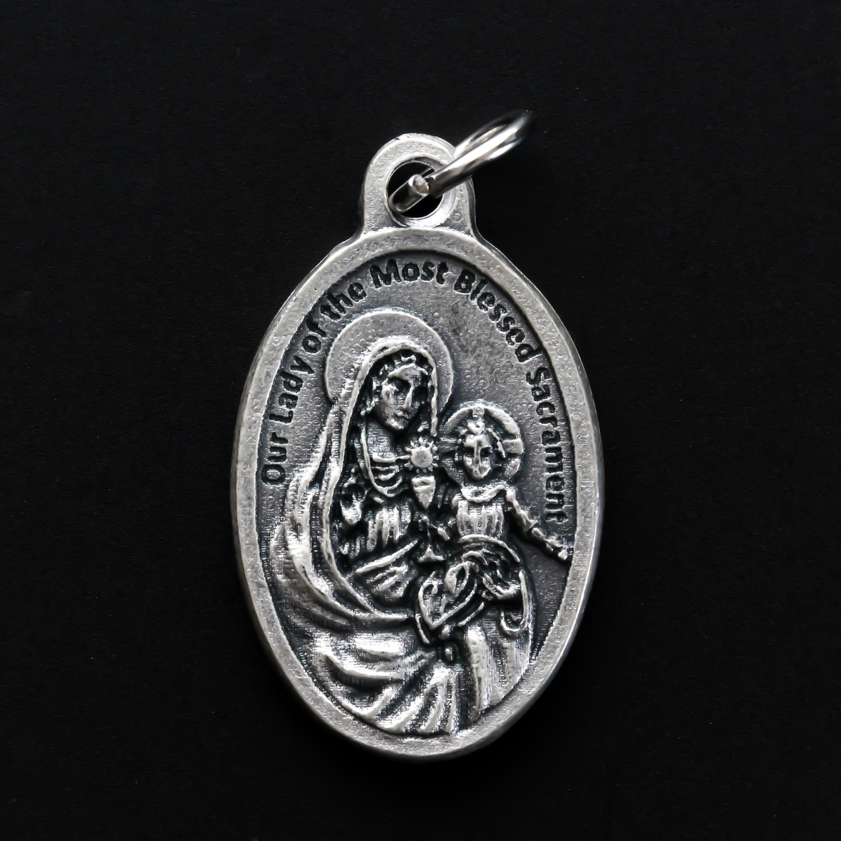 Saint Peter Julian Eymard medal that depicts the saint on the front and Our Lady of the Most Blessed Sacrament on the back