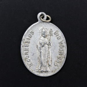 Vintage aluminum religious medal of Saint Cornelius