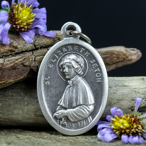 die cast silver medal depicting patron saint elizabeth ann seton