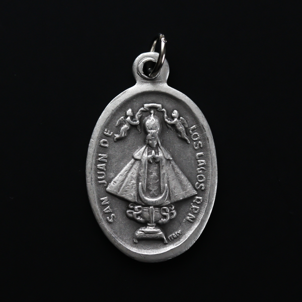 Our Lady of San Juan de Los Lagos medal that depicts the image of Our Lady on the front and the Sacred Heart of Jesus on the back