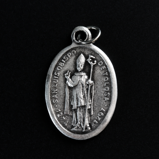 Saint Louis of Toulouse medal that depicts the saint on the front and the Mission San Luis Obispo de Tolosa on the back