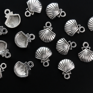 Small silver-tone scallop shell charms