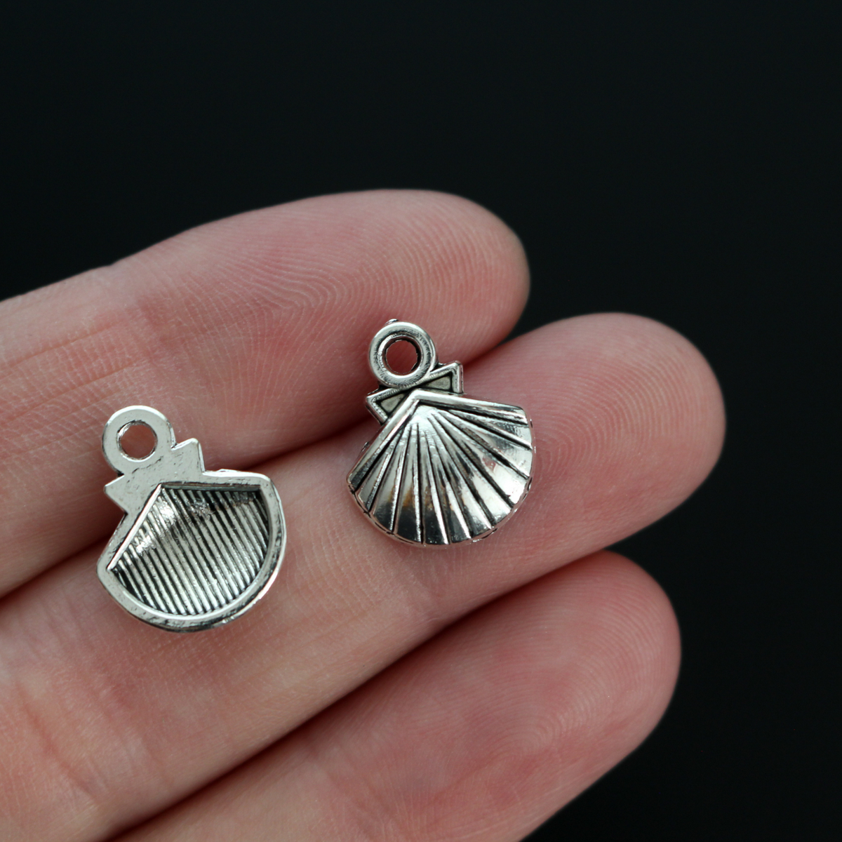 Small silver-tone scallop shell charms