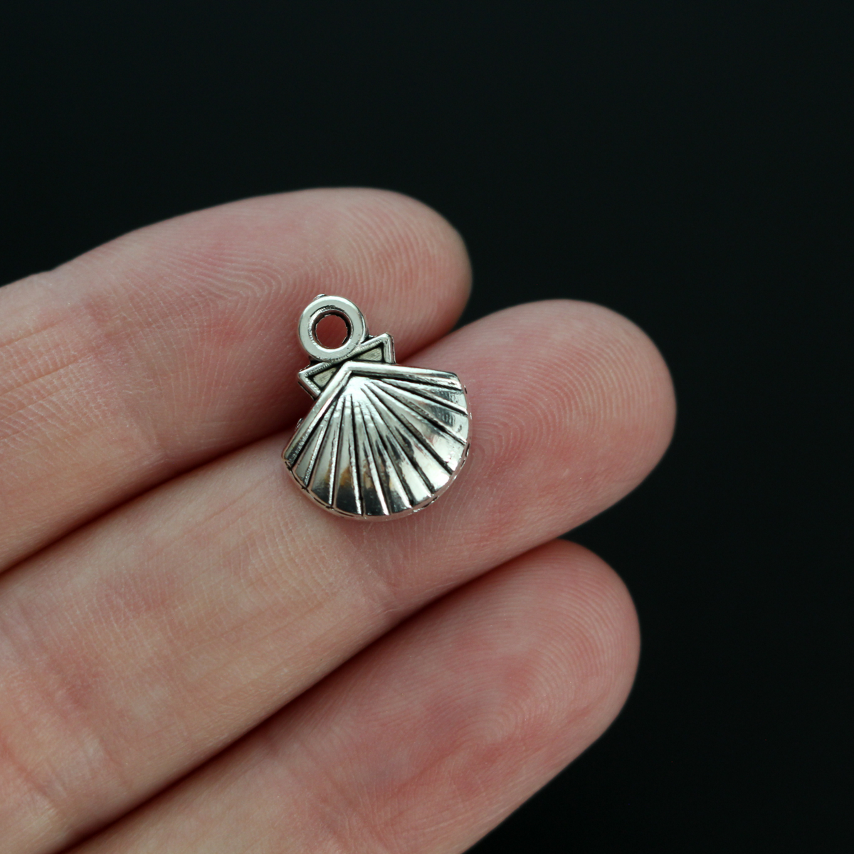 Small silver-tone scallop shell charms