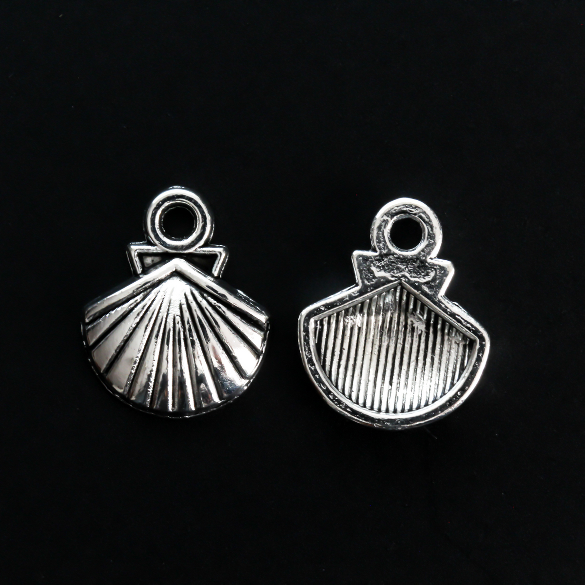 Small silver-tone scallop shell charms