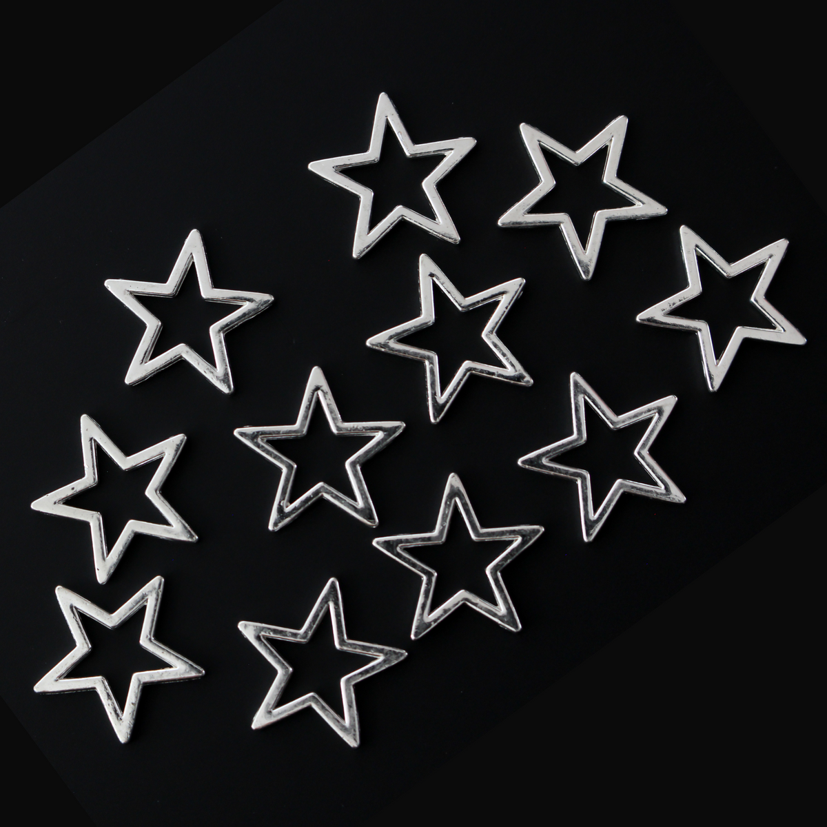 Hollow star connector links, 17mm sold in packs of 20 pieces