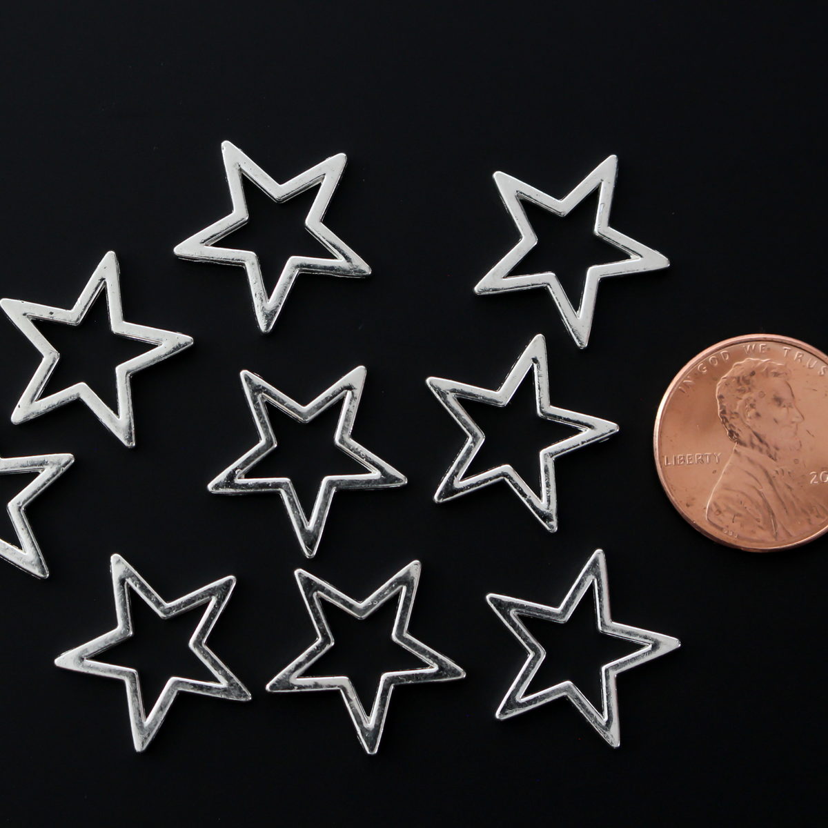 Hollow star connector links, 17mm sold in packs of 20 pieces