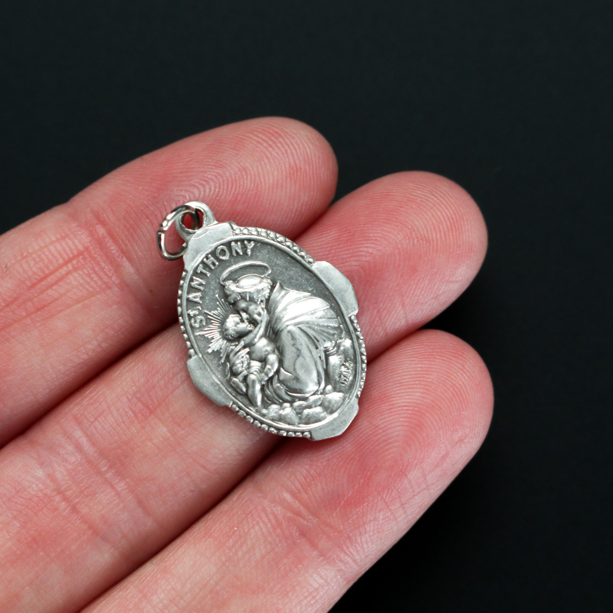 Saint Anthony of Padua deluxe ornate medal that depicts St. Anthony holding infant Jesus on the front and "Pray For Us" on the back