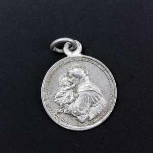 vintage aluminum religious medal of St Francis of Assisi
