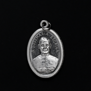 Saint Josemaría Escrivá round medal. The front of the medal depicts Saint Josemaría Escrivá, the reverse is marked "Patron Saint of Diabetics