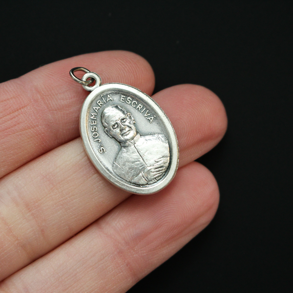 Saint Josemaría Escrivá round medal. The front of the medal depicts Saint Josemaría Escrivá, the reverse is marked "Patron Saint of Diabetics