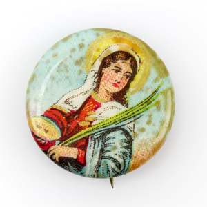 St Lucy celluloid pinback button