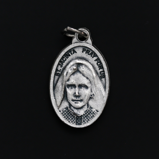 Saints Jacinta and Francisco Marto medal that depicts each saint on one side. Made in Italy.