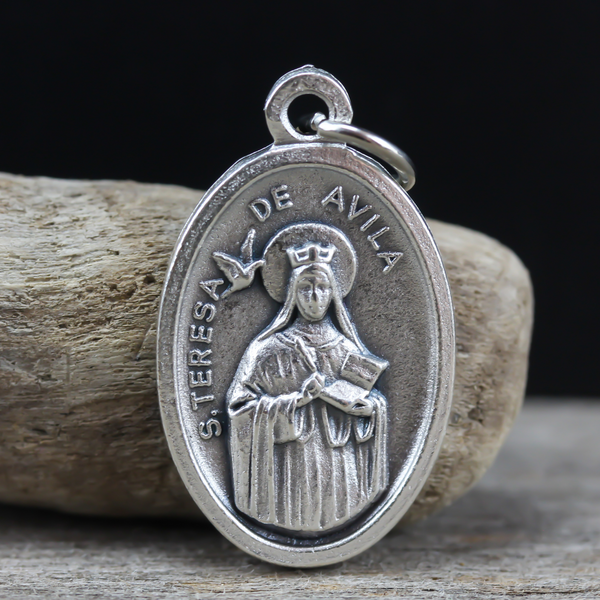 saint teresa avila die-cast silver one inch oval medal