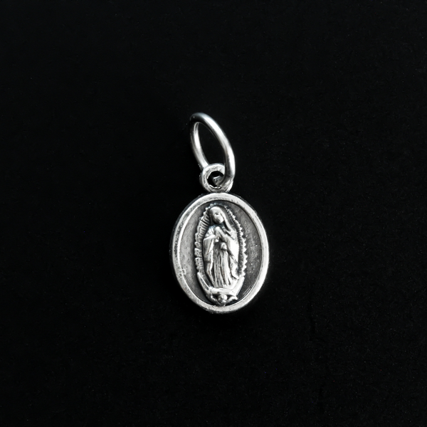 Tiny Divine Mercy of Jesus medal with Our Lady of Guadalupe on the backside