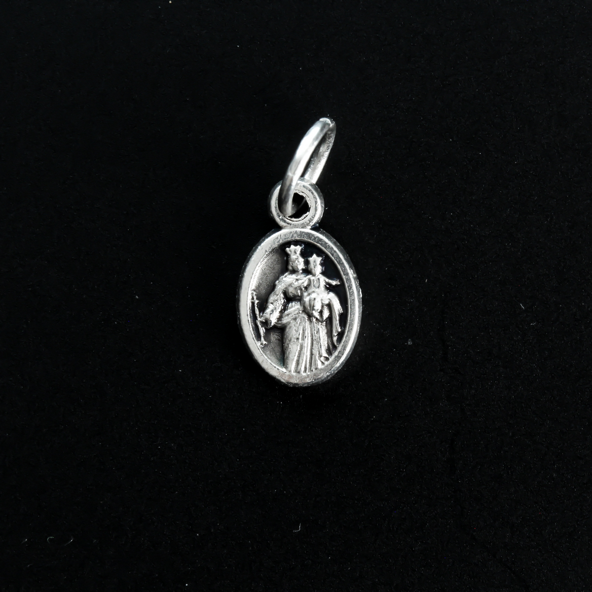 Saint Giovanni "Don" Bosco mini medal that depicts St. Don Bosco on the front and Mary, Help of Christians, on the back