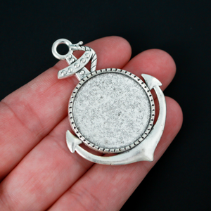 Large silver cabochon setting shaped like an anchor with a 25mm tray.