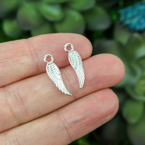 17mm long silver tone solid wing charm