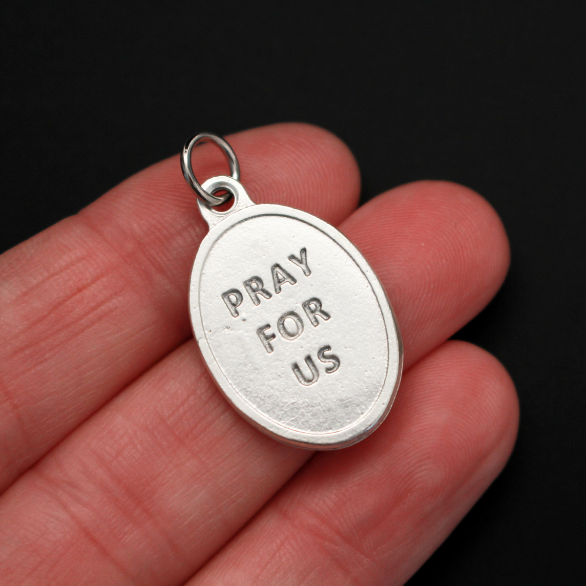 Saint Antony the Great medal. The front depicts the saint and the reverse is marked "Pray For Us".