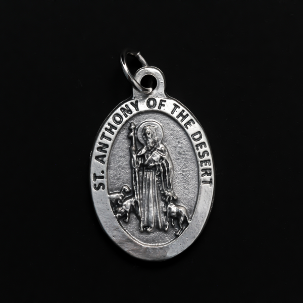 Saint Antony the Great medal. The front depicts the saint and the reverse is marked "Pray For Us".