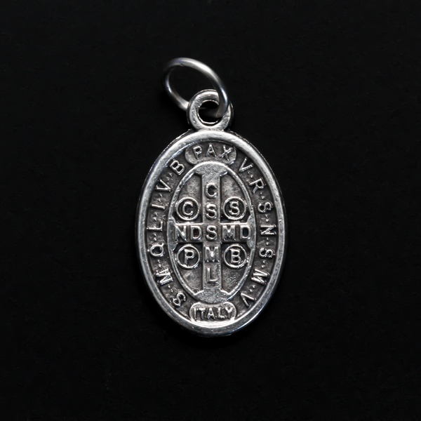 St. Benedict protection medal that depicts the saint on the front. This medal is slightly smaller than our one inch version, it measures 7/8" from the top of the bale to the bottom of the medal