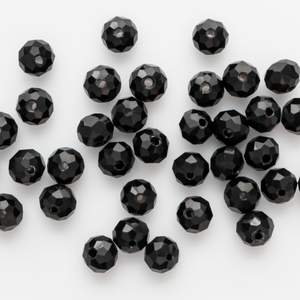 Asian cut crystal glass beads. Black 8mm x 6.2mm rondelle faceted. Sold in packages of 60 beads