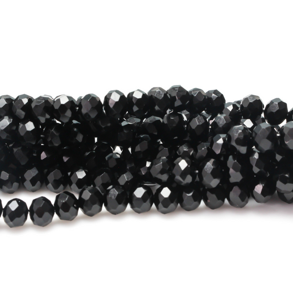 Opaque glass faceted rondelle beads that are solid black in color, 8x6mm