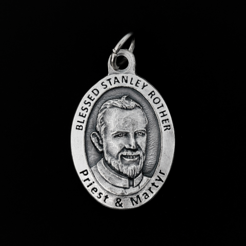 Blessed Stanley Rother medal that depicts the priest on the front and is marked "Pray for us" on the back.