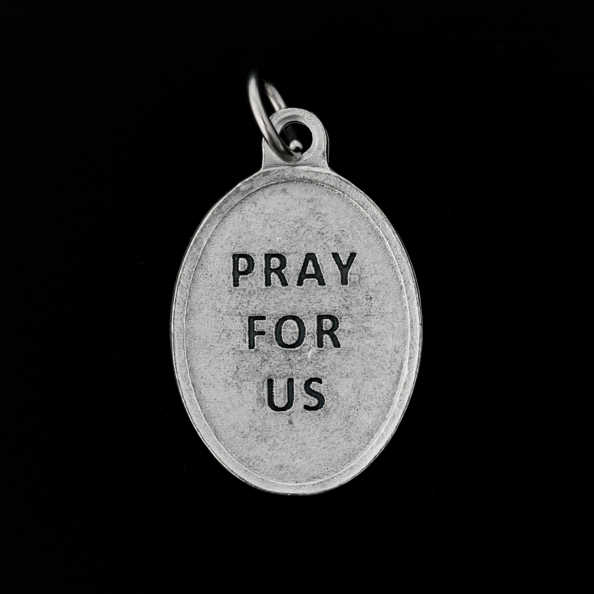Blessed Stanley Rother medal that depicts the priest on the front and is marked "Pray for us" on the back.